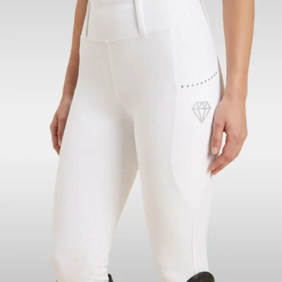 White Elite Competition riding breeches by Diamont Equestrian with crystal-trimmed side pocket and diamond logo, front three-quarter view