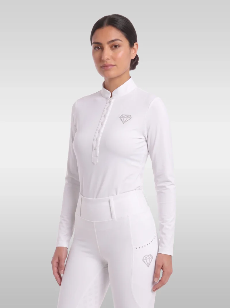 White Elite Competition long sleeve base layer by Diamont Equestrian with stand-up collar, button placket and rhinestone diamond logo, front three-quarter view