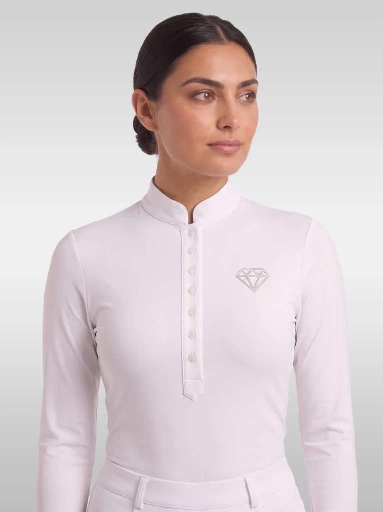 Front view of the white Elite Competition long sleeve base layer by Diamont Equestrian with high stand collar and button placket