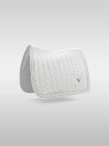 White Prestige dressage saddle pad by Diamont Equestrian with chevron quilting, contrast piping and a metal diamond badge