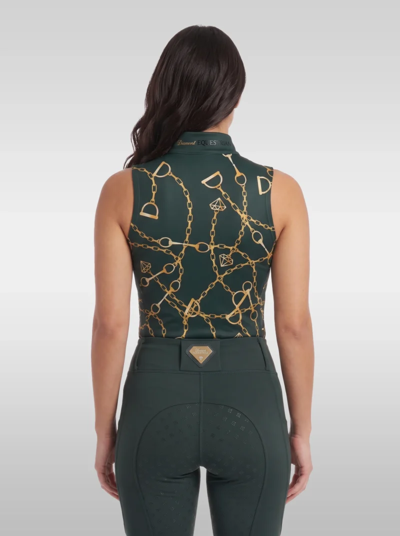 Back view of the green Signature sleeveless riding top with all-over gold chain, bit and stirrup print