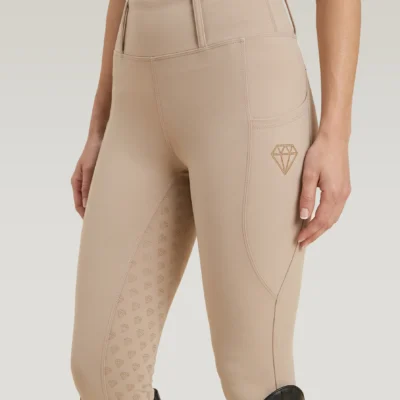 Beige Prestige riding leggings by Diamont Equestrian with diamond logo on the side pocket and diamond silicone grip, front three-quarter view