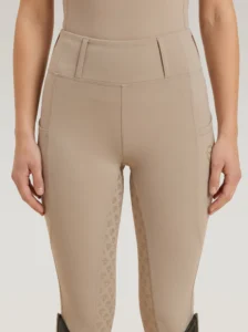 Front view of beige Prestige riding leggings by Diamont Equestrian with high-rise waistband and belt loops