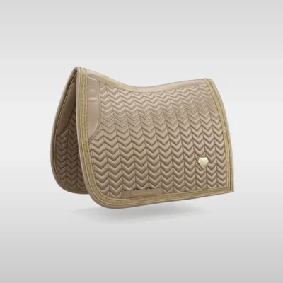 Beige Prestige dressage saddle pad by Diamont Equestrian with chevron quilting, contrast piping and a metal diamond badge