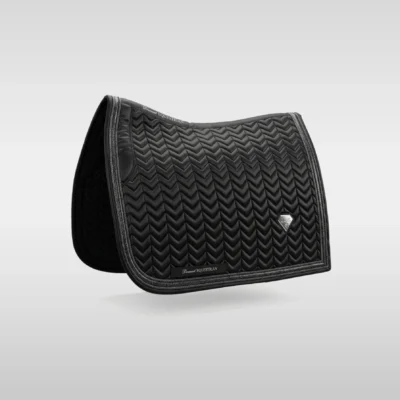 Black Prestige dressage saddle pad by Diamont Equestrian with chevron quilting, contrast piping and a metal diamond badge