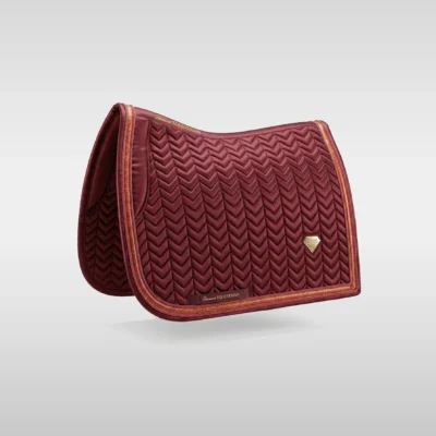 Burgundy Prestige dressage saddle pad by Diamont Equestrian with chevron quilting, contrast piping and a metal diamond badge