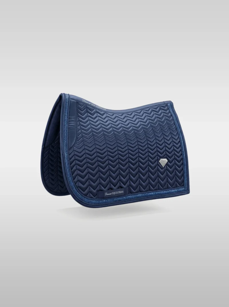 Navy Prestige dressage saddle pad by Diamont Equestrian with chevron quilting, contrast piping and a metal diamond badge