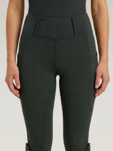 Front view of green Prestige riding leggings by Diamont Equestrian with high-rise waistband and belt loops