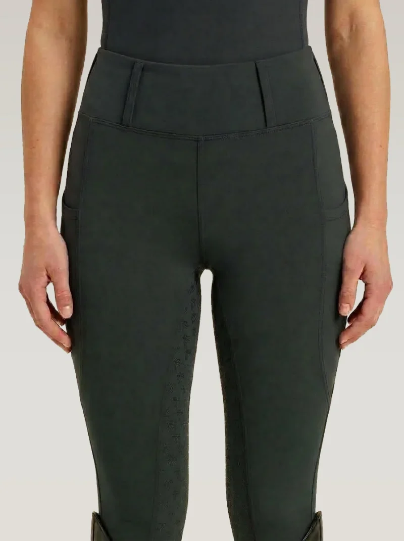 Front view of green Prestige riding leggings by Diamont Equestrian with high-rise waistband and belt loops