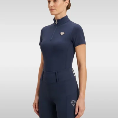 Navy Prestige base layer by Diamont Equestrian with silver quarter-zip and silver metal diamond badge on the chest, front three-quarter view