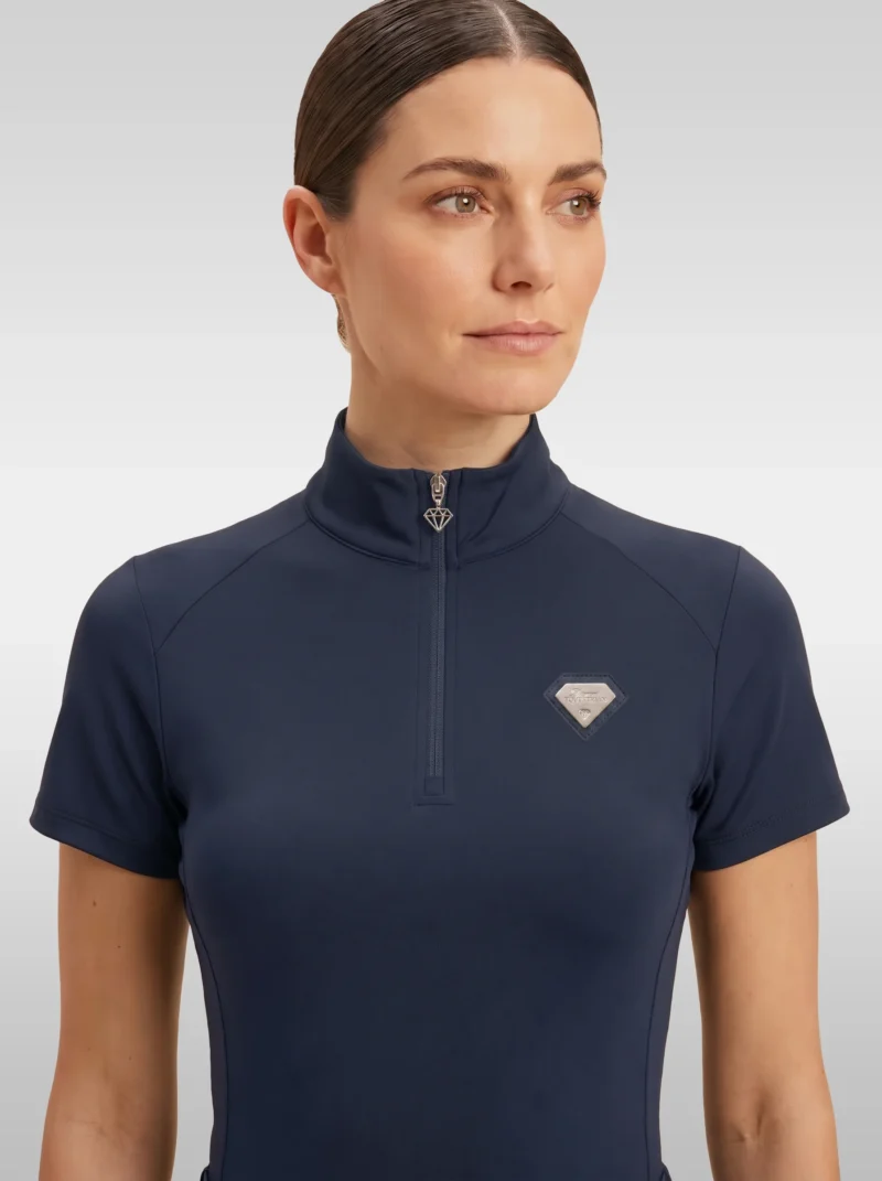 Front view of the navy Prestige base layer by Diamont Equestrian with high collar, silver zip and diamond badge