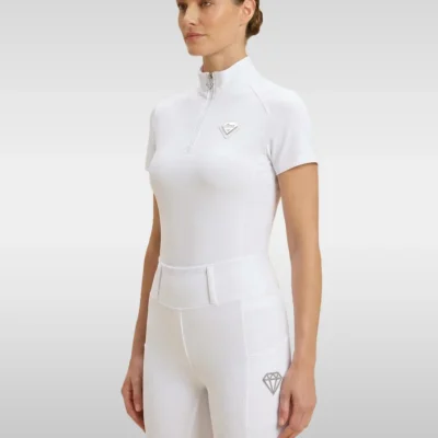 White Prestige base layer by Diamont Equestrian with silver quarter-zip and silver metal diamond badge on the chest, front three-quarter view