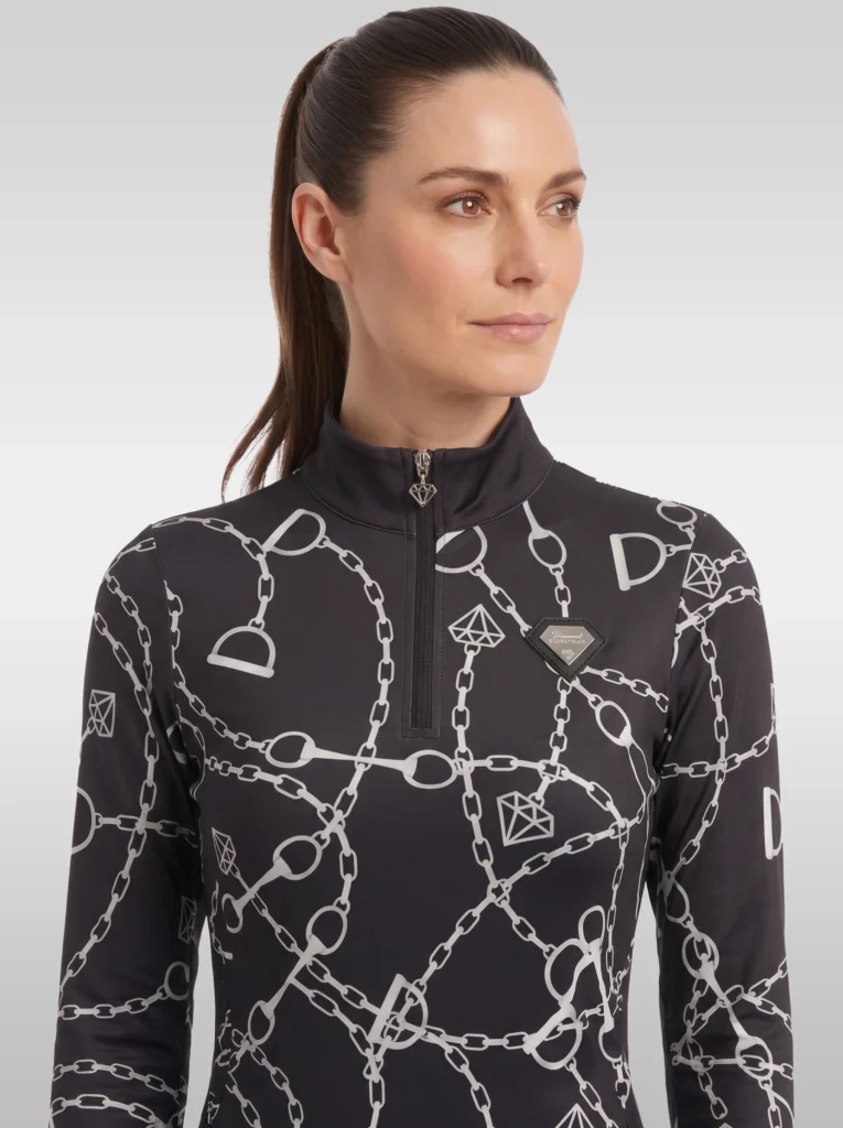 Front view of the black Signature long sleeve equestrian base layer with stand-up collar, silver zip and silver diamond badge