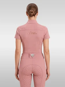 Back view of the blush pink Allure riding shirt with Diamont Equestrian lettering across the shoulders