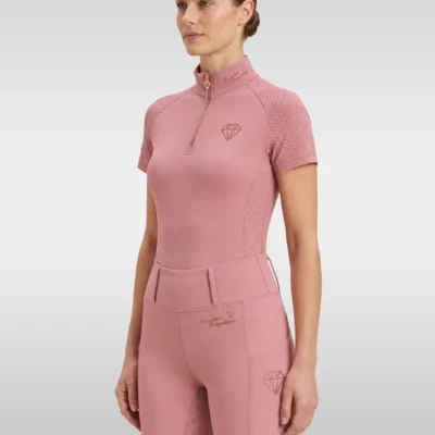 Blush pink Allure base layer by Diamont Equestrian with quarter-zip collar, perforated sleeves and rose-gold diamond logo, front three-quarter view