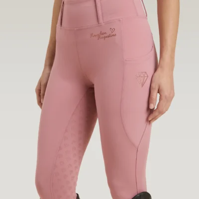 Blush Pink Allure riding leggings by Diamont Equestrian with diamond logo on the side pocket and diamond silicone grip, front three-quarter view