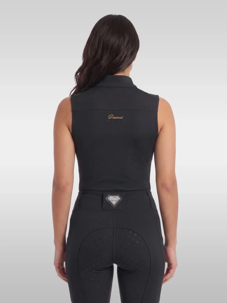 Back view of the black Prestige sleeveless riding top with Diamont script between the shoulders