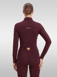 Back view of the burgundy Prestige long sleeve riding shirt with gold Diamont script across the shoulders