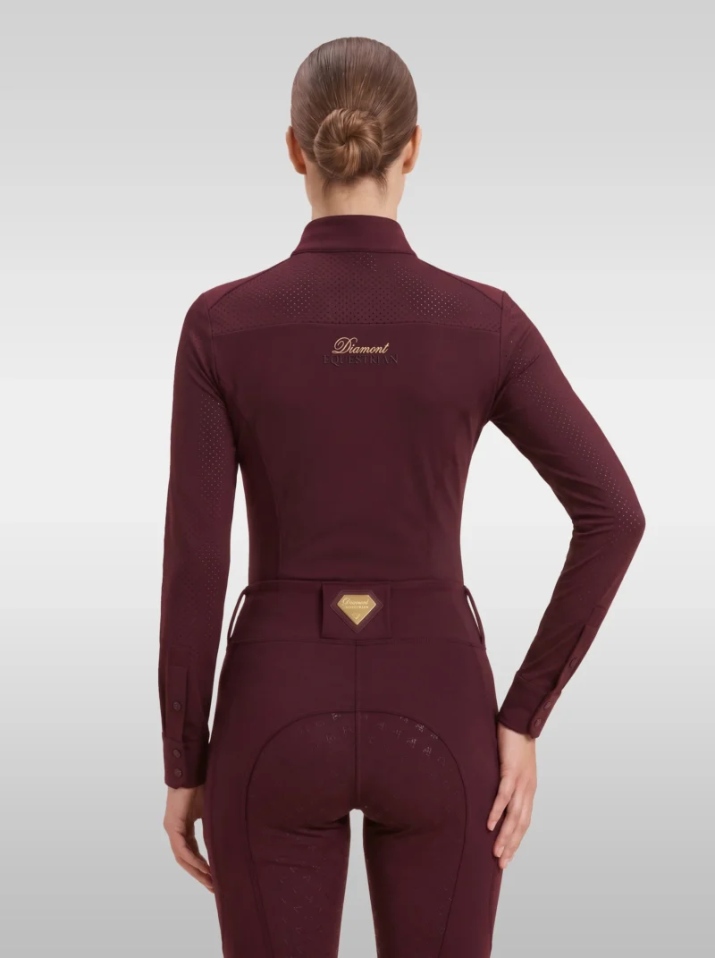 Back view of the burgundy Prestige long sleeve riding shirt with gold Diamont script across the shoulders