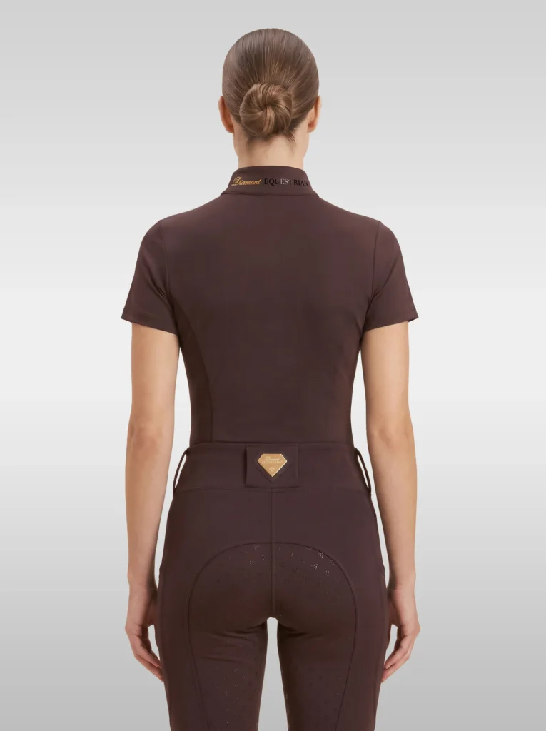 Back view of the chocolate brown Prestige riding shirt with Diamont lettering on the collar
