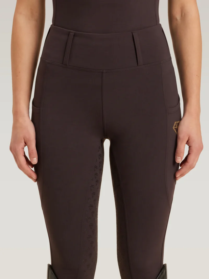 Front view of chocolate Prestige riding leggings by Diamont Equestrian with high-rise waistband and belt loops