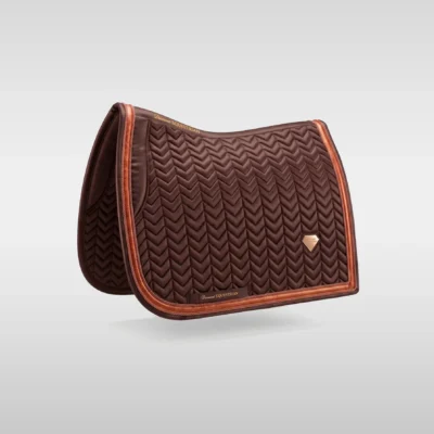Chocolate Prestige dressage saddle pad by Diamont Equestrian with chevron quilting, contrast piping and a metal diamond badge