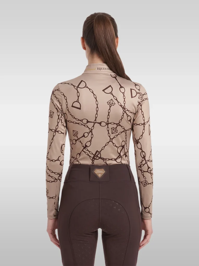 Back view of the beige Signature long sleeve riding shirt with all-over chain, bit and stirrup print