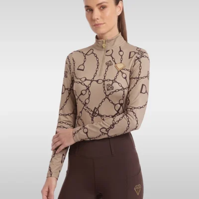 Beige Signature long sleeve base layer by Diamont Equestrian with chain and stirrup print, gold quarter-zip and gold diamond badge, front three-quarter view